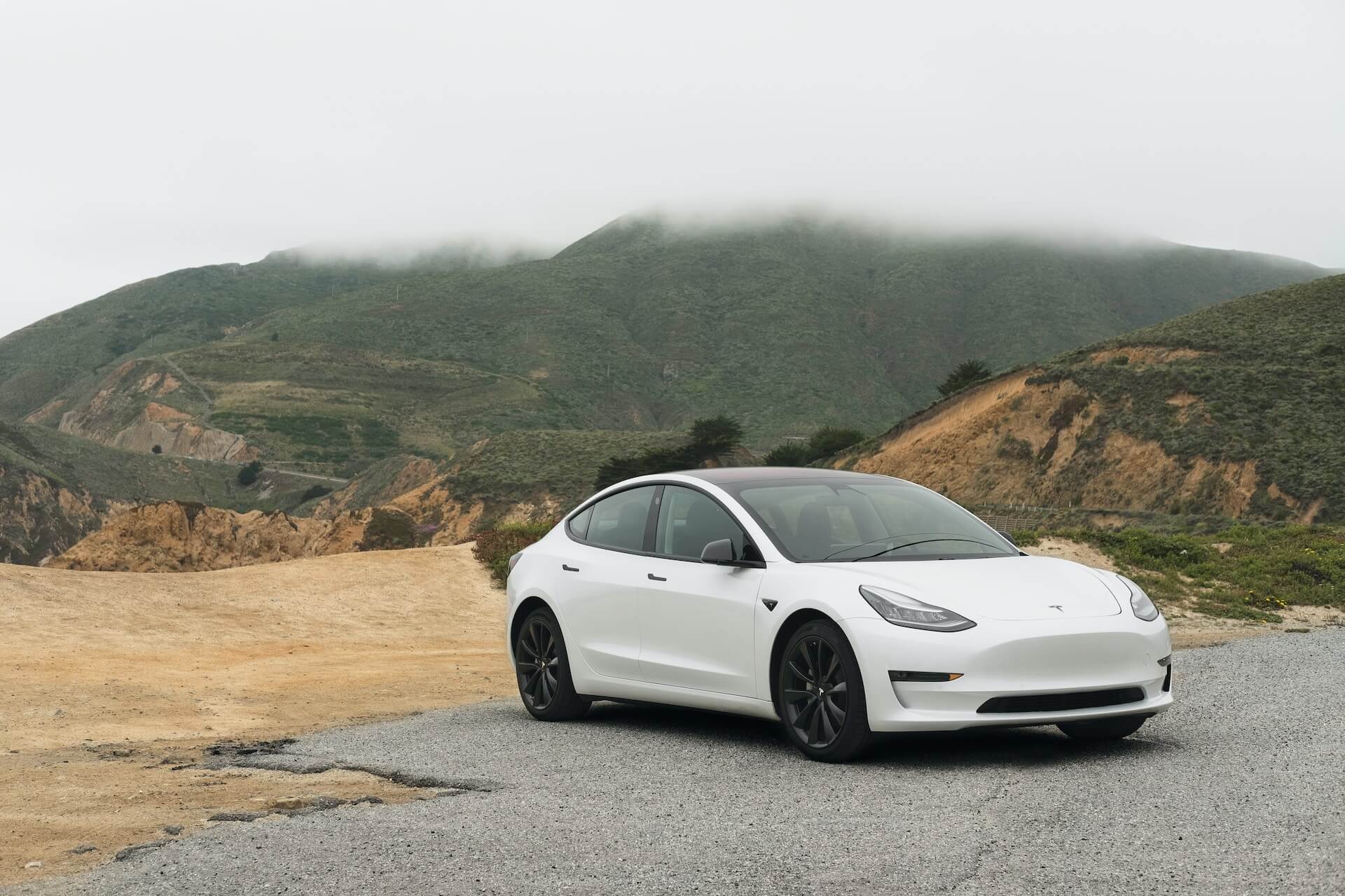 White Tesla car, parked
