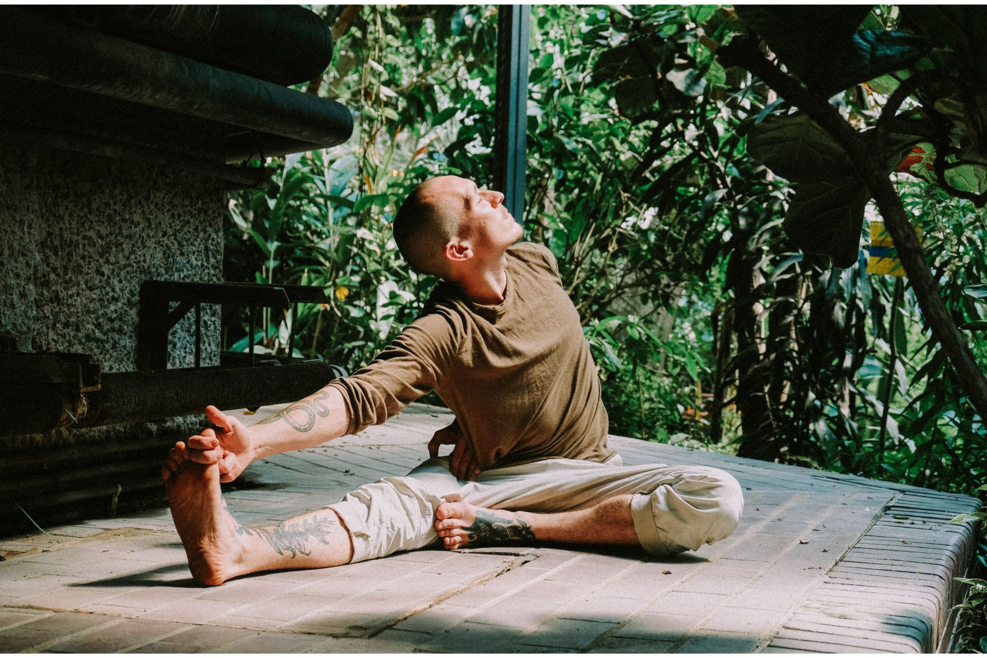 Man stretching on floor.