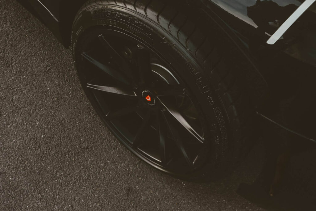 Tire on a black car