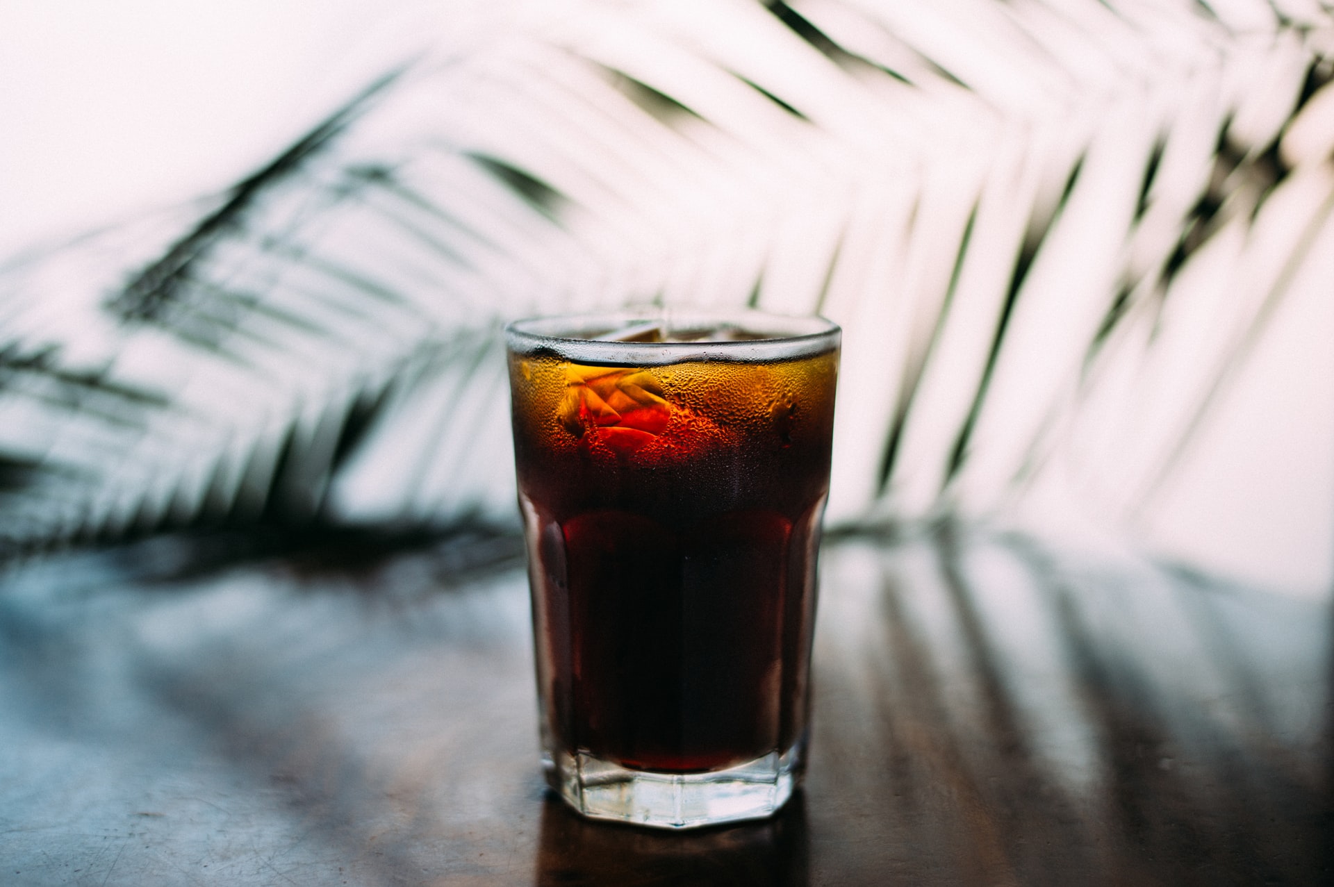Rum and coke in glass.