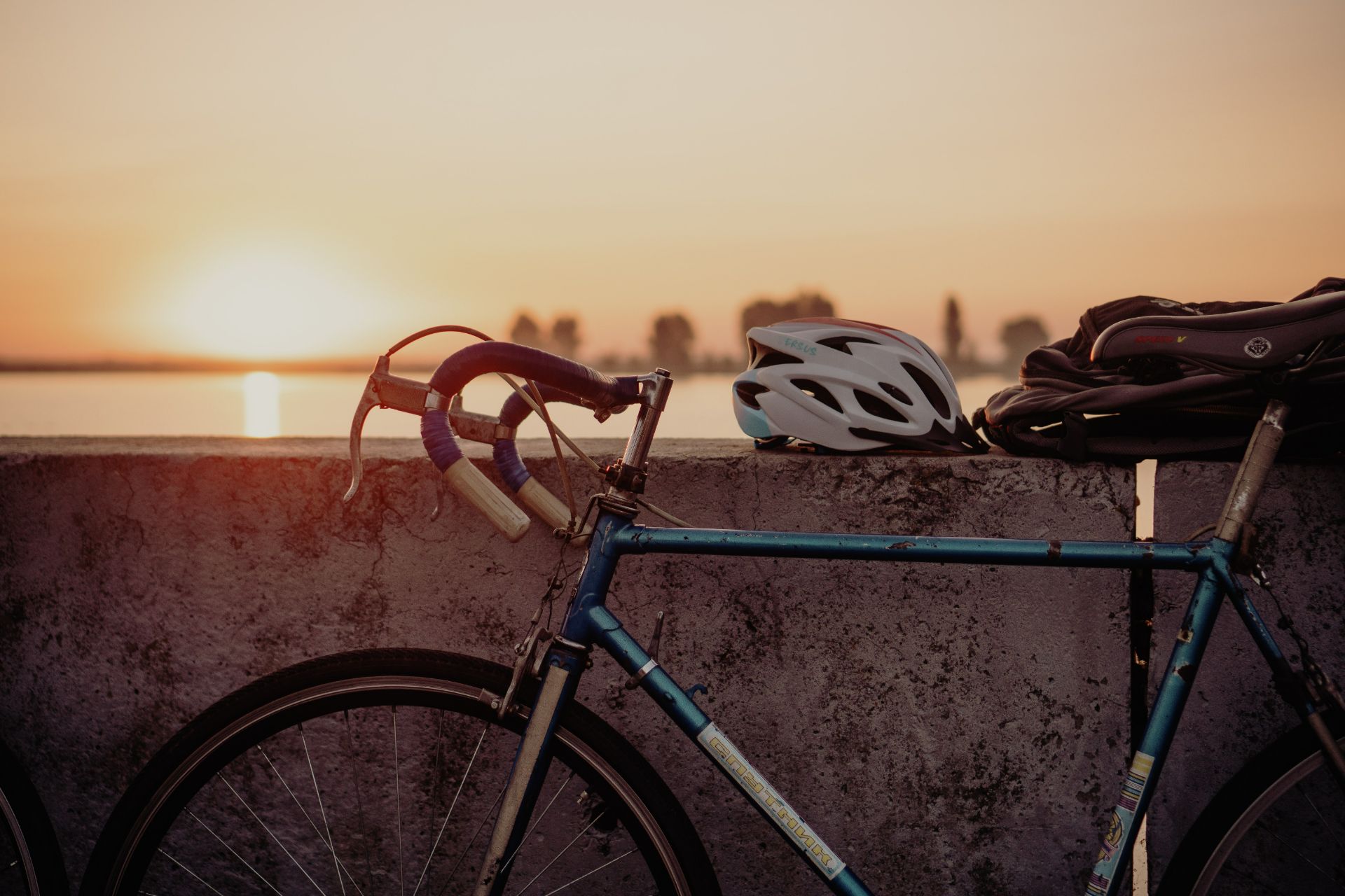 Blue bike at sunset.