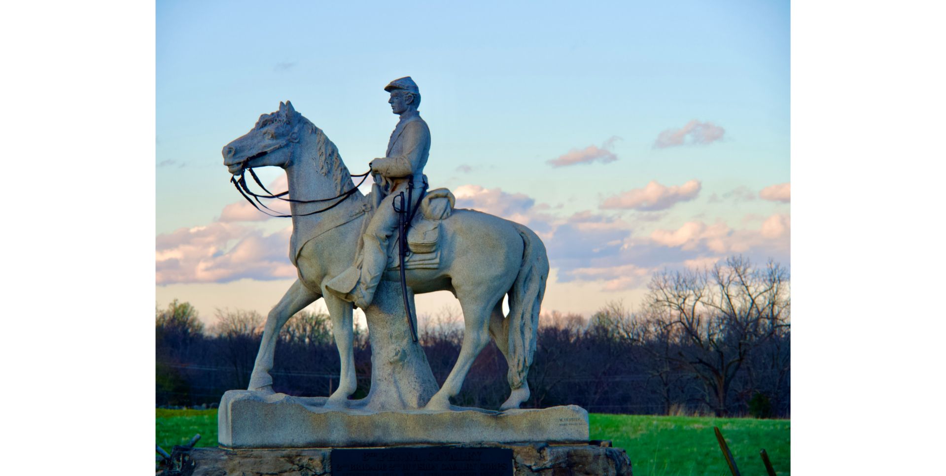 Statue of man on horse.