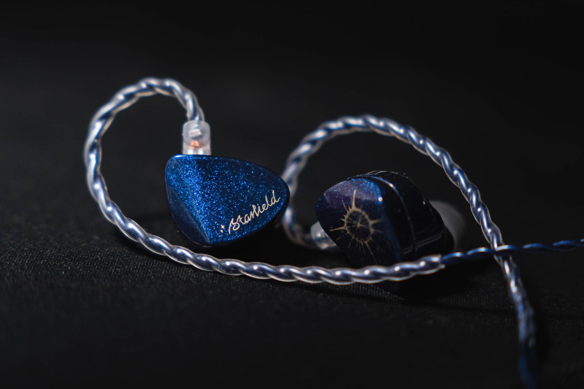 Choosing between IEM vs headphones can all come down to what you're willing to spend.