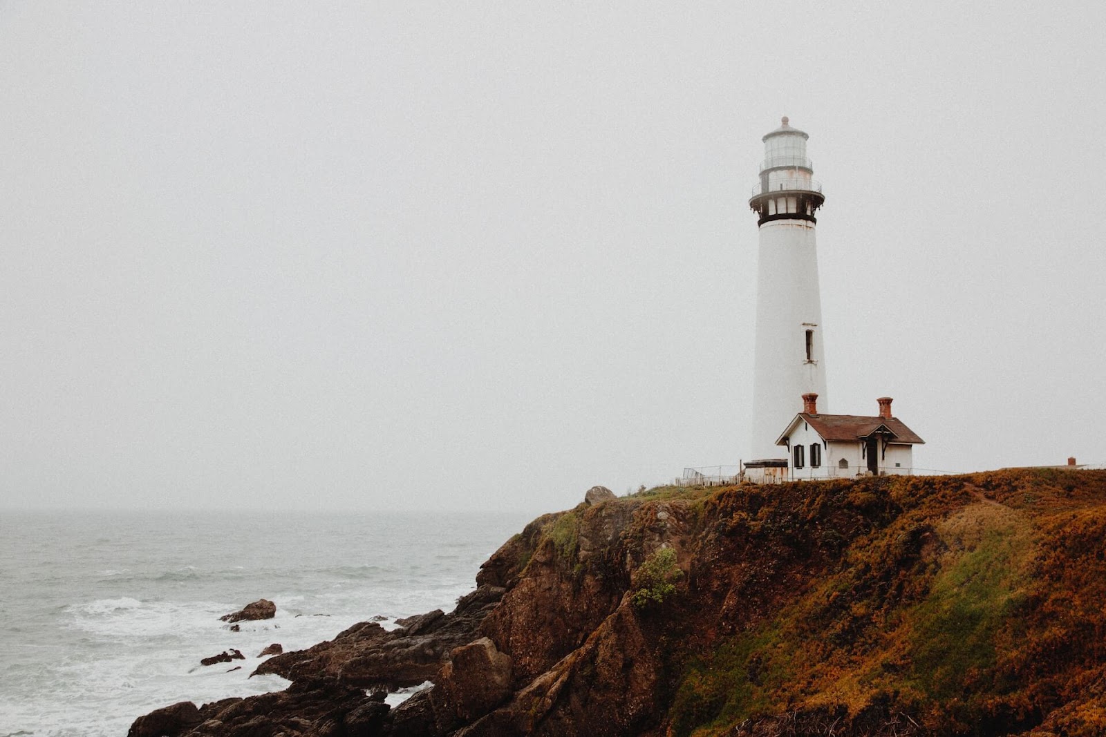 Pigeon Point Lighthouse in California during overcast weather