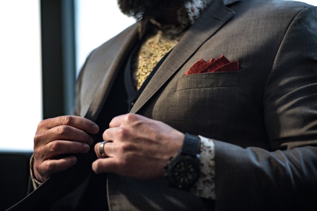A close up of a man's red pocket square