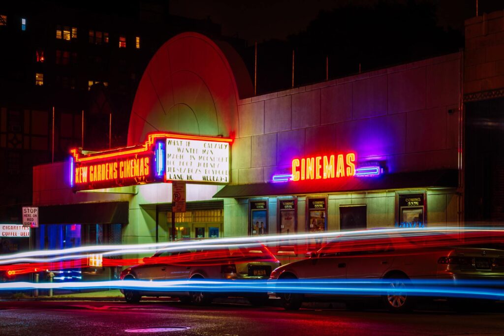 Photo of a movie cinema at night with bright colors