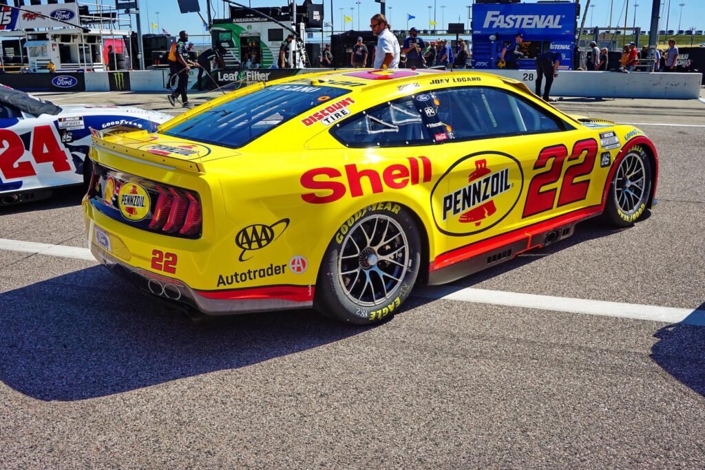 Joey Logano's Ford Mustang rests on the starting grid. 