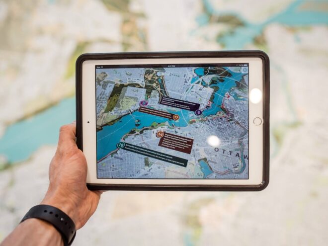 hand holding an ipad with a map