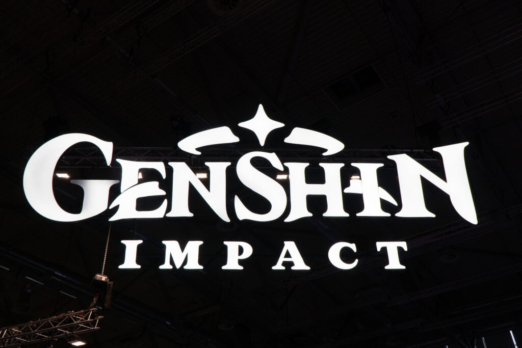 Genshin Impact sign at gaming conference.