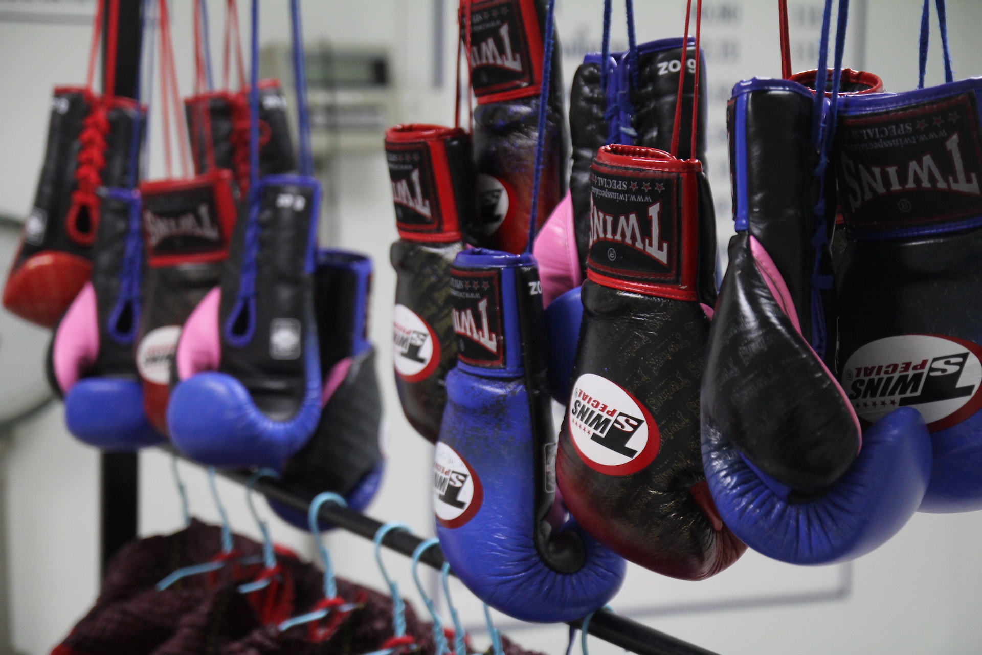 Boxing gloves hanging up for Muay Thai
