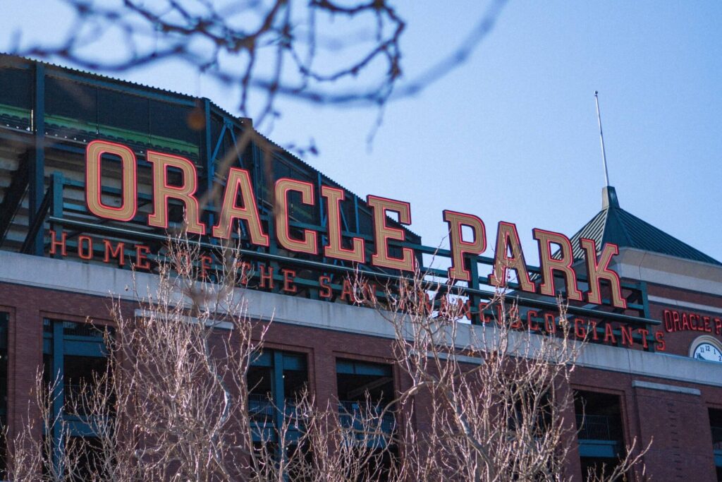 Tree branches stand in front of the entrance to Oracle Park in San Francisco. 