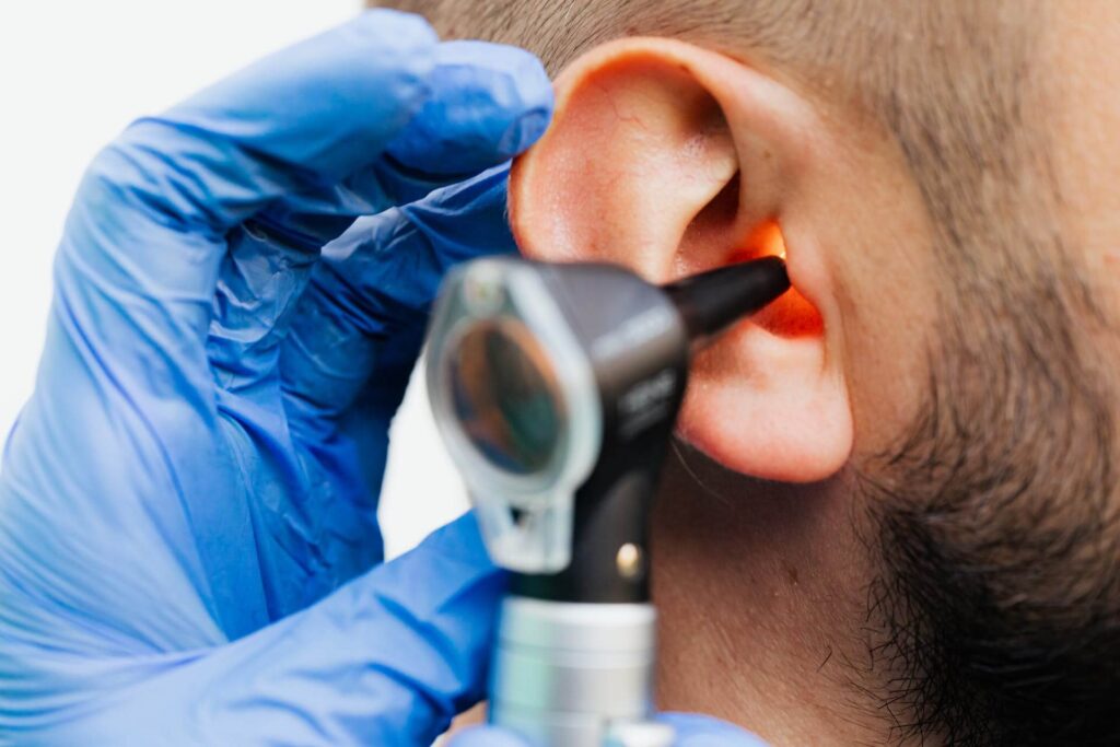 close up of an ear check with an otoscope