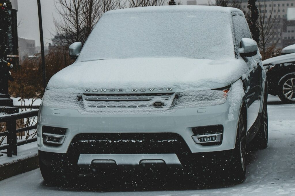 A range rover covered in a thin layer of frost
