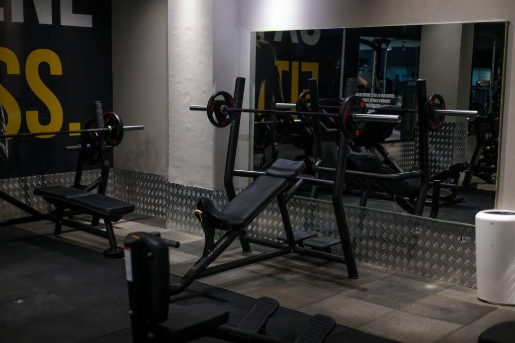 An empty weight bench in a gym