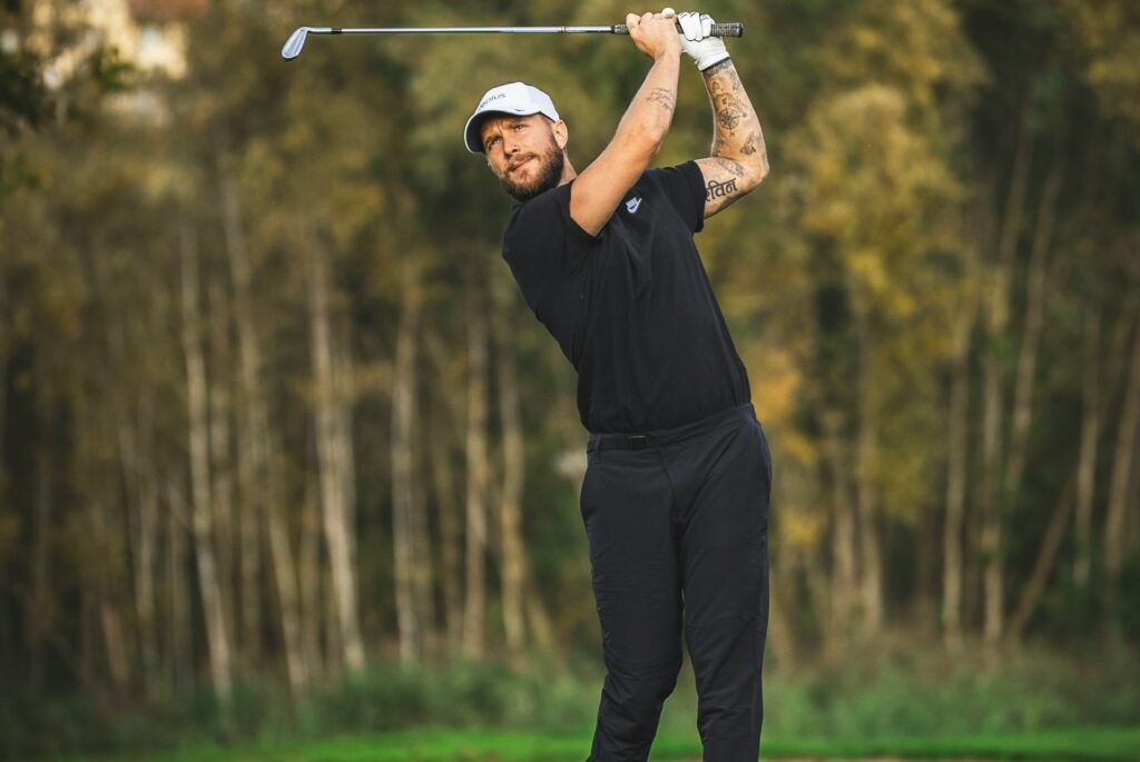 A man golfing