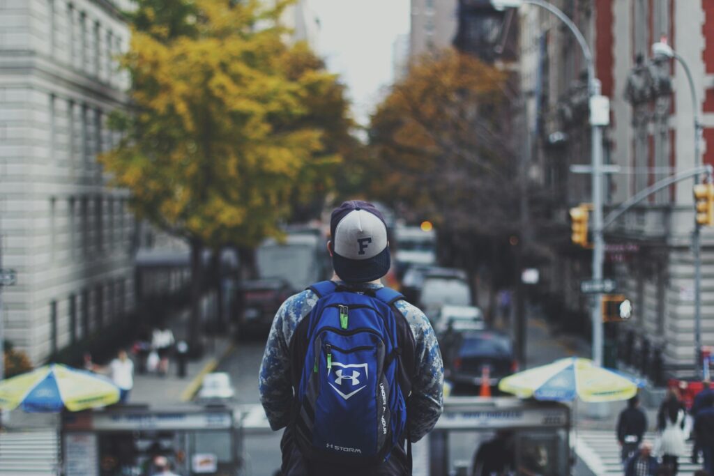 Man with a backpack on a New York City street