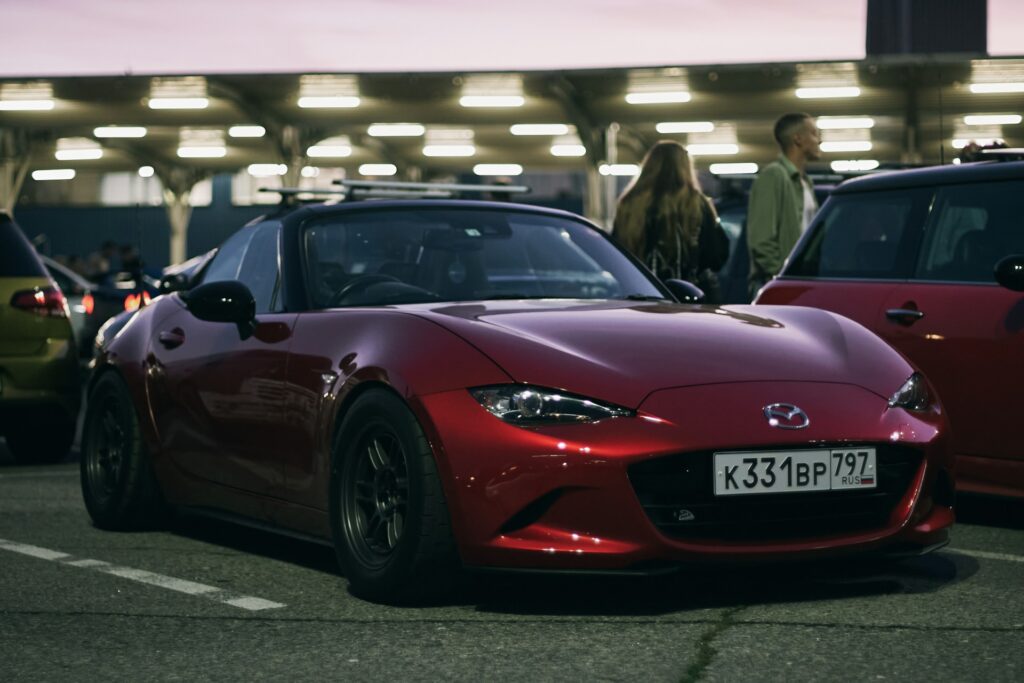 a red Mazda Miata