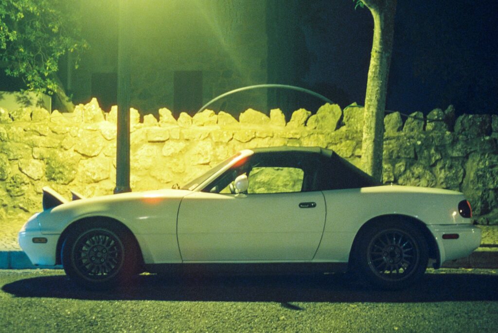 a white Mazda Miata